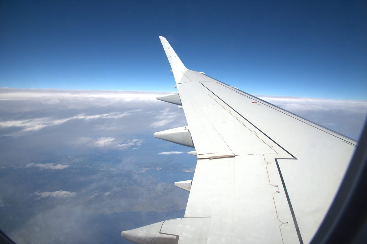 Aircraft wing above cloud